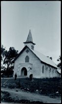 Fathers Celestine Holzem, SS.CC., and Theodose Herkenrath, SS.CC., in front of Saint Joseph Church, Makawao, Maui.